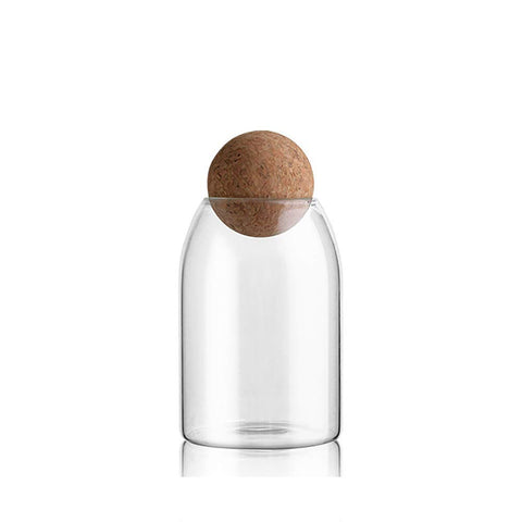 MOLFUJ 750ml ball cork glass canister with airtight lid preserves freshness.