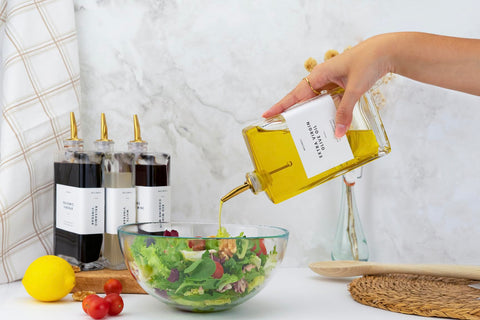 Molimoli pouring action demonstrates controlled flow for neat dressing and sauces.