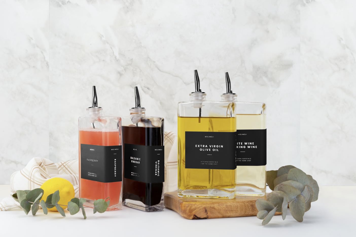 Versatile glass bottles suitable for oil, vinegar, syrup, and sauces.