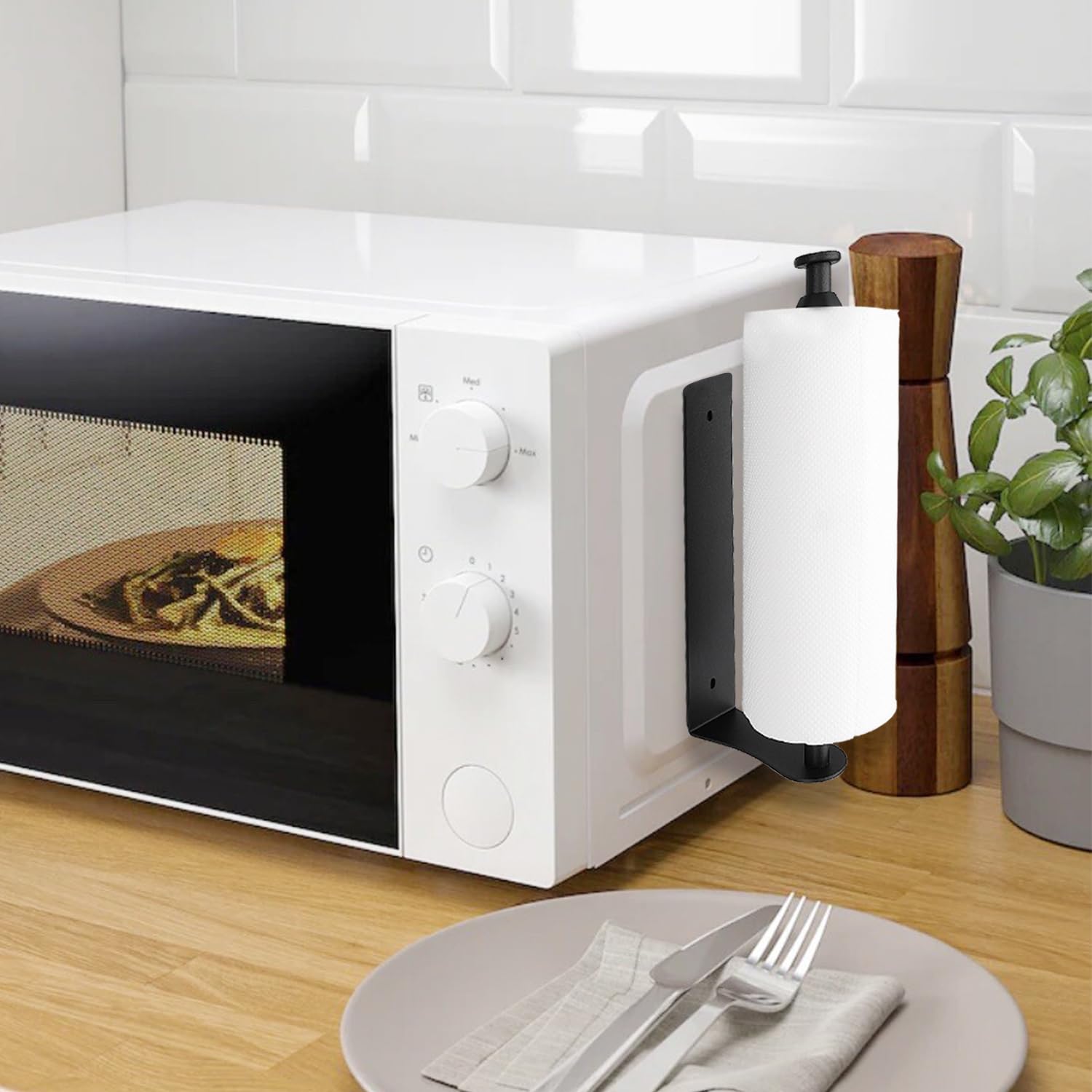 Space-saving vertical placement frees countertop workspace