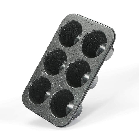 Monfish jumbo deep muffin pan in oven demonstrates even heat for uniform baking.