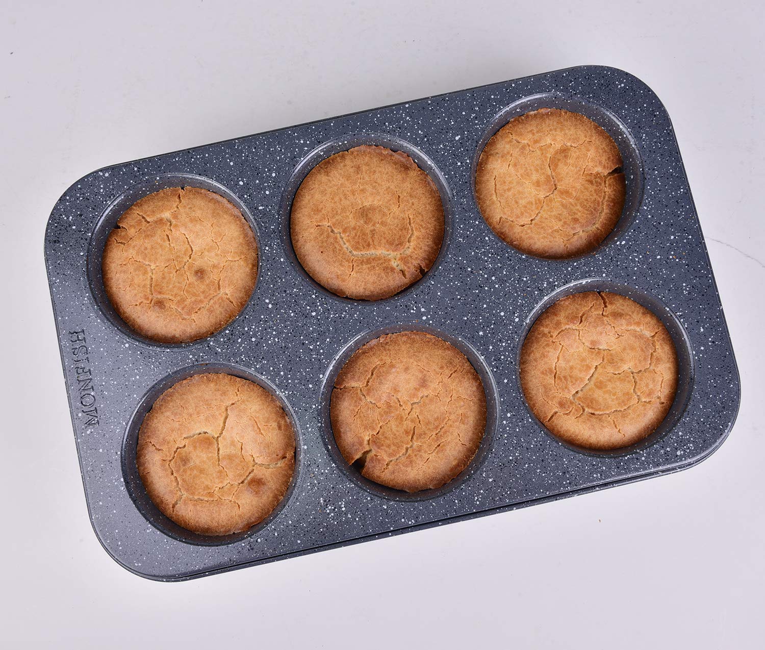 Monfish jumbo deep muffin pan non-stick coating allows easy release of muffins.