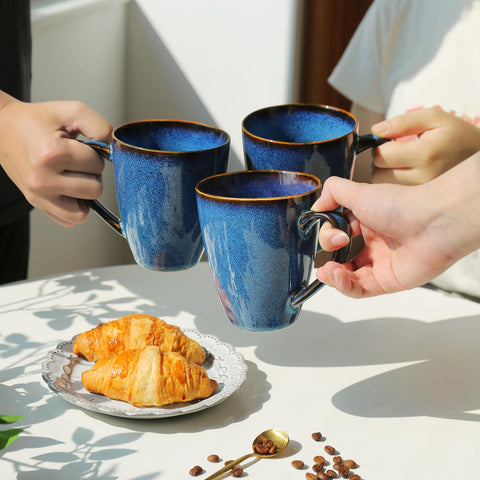 MONITO Starry Blue mug on kitchen cabinet, durable stoneware for daily use.