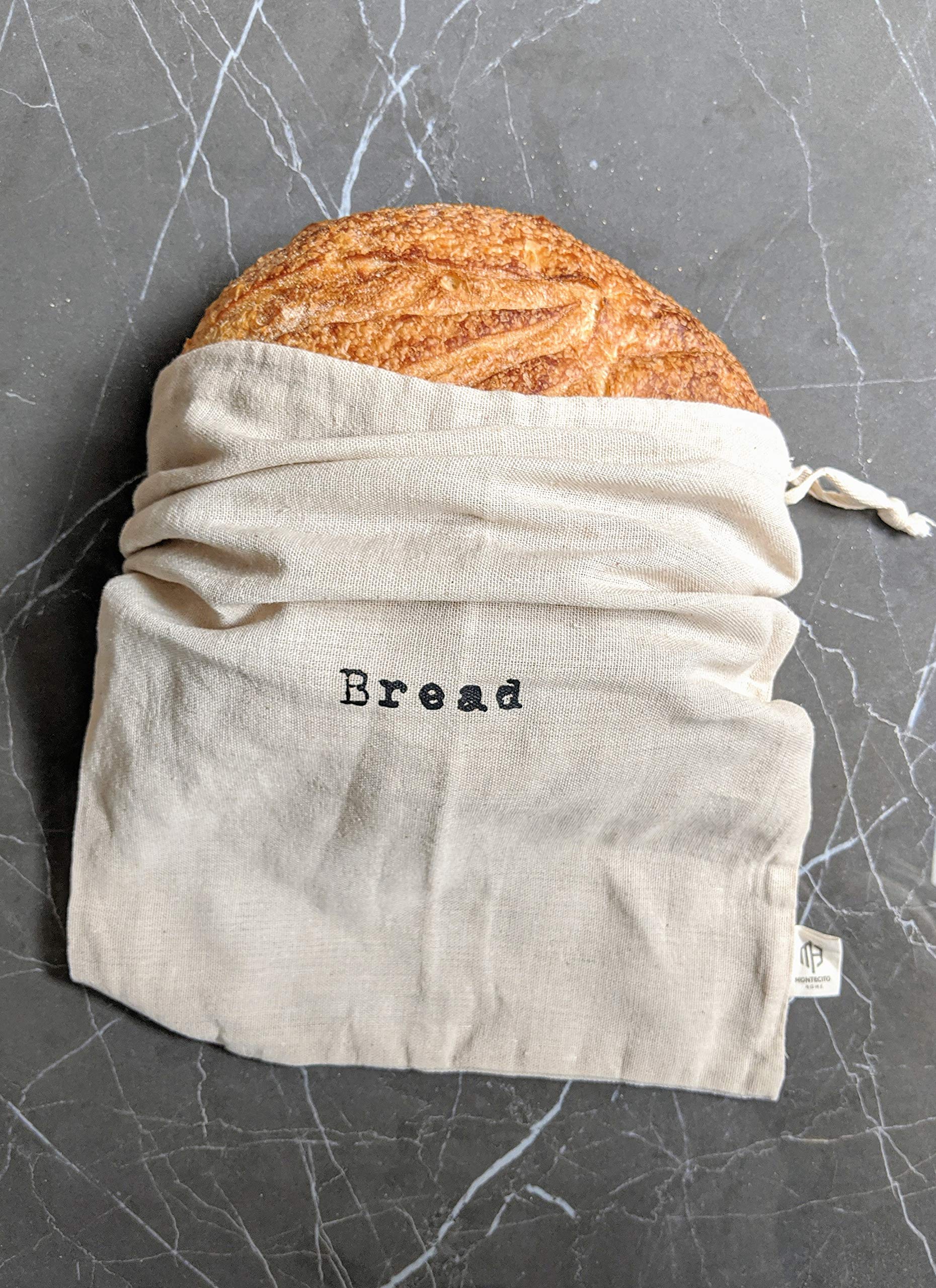 Montecito Home bread bags with drawstring shown in use.
