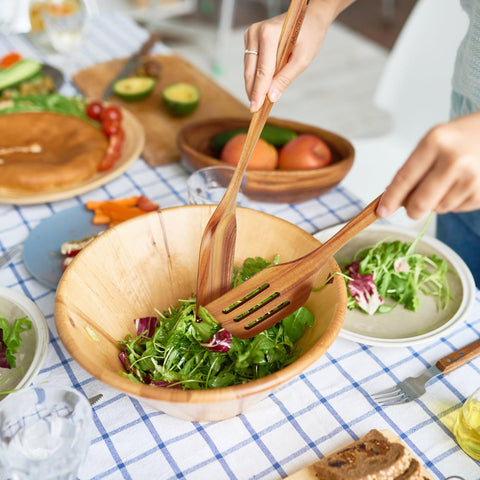 Mooues teak wooden spatula flat shows versatile flipping and mixing