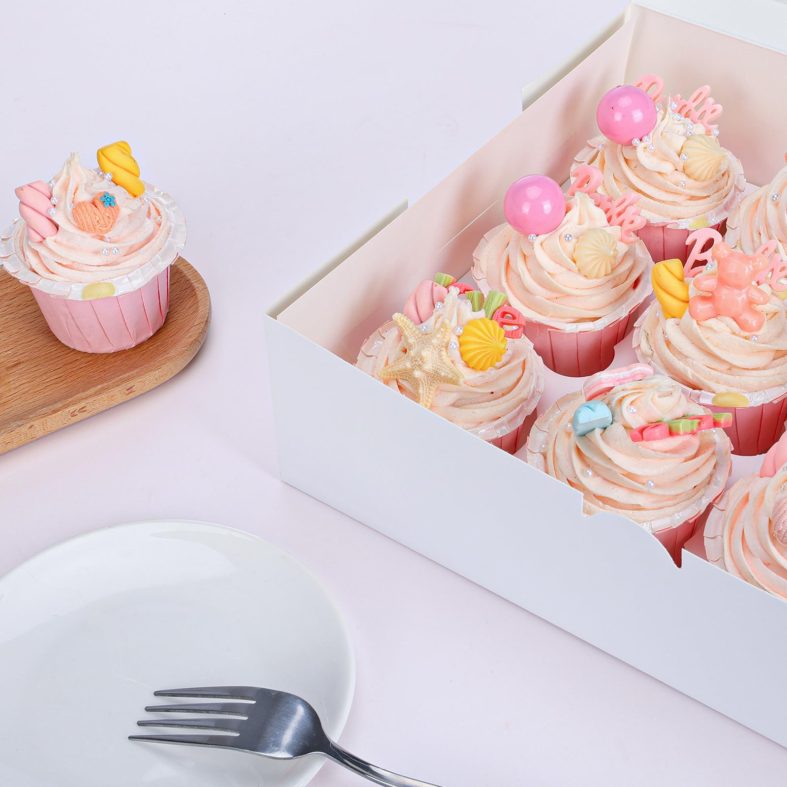 Moretoes cupcake box with clear window lets customers preview contents.