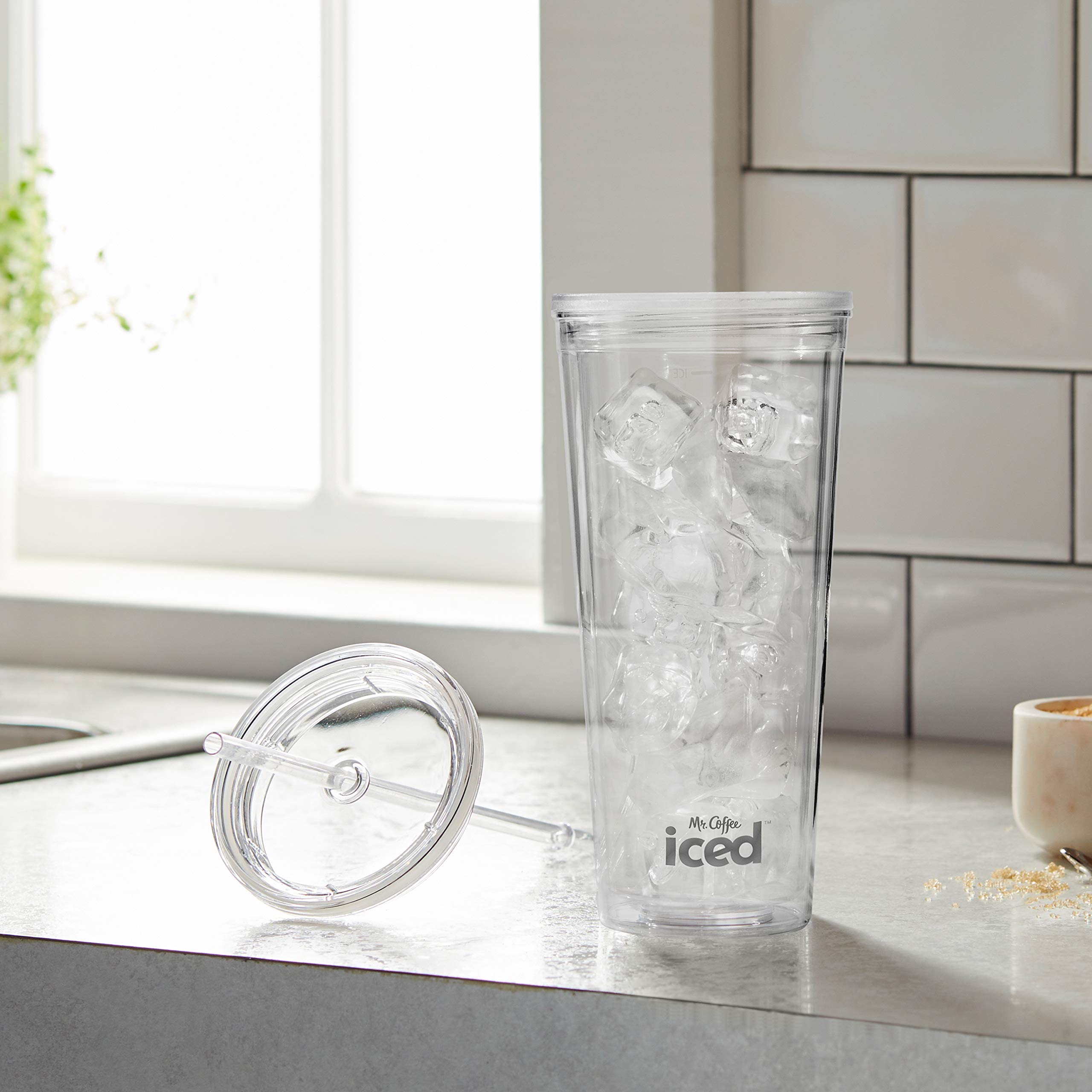 Mr. Coffee tumbler shows water and ice measurements for consistency.