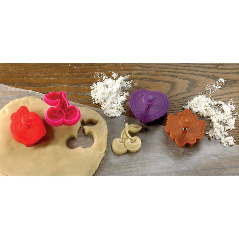 Mrs. Anderson's Baking cutter emboss action releases dough with spring mechanism.
