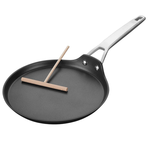 MsMk crepe pan with spreader in action for thin crepes.