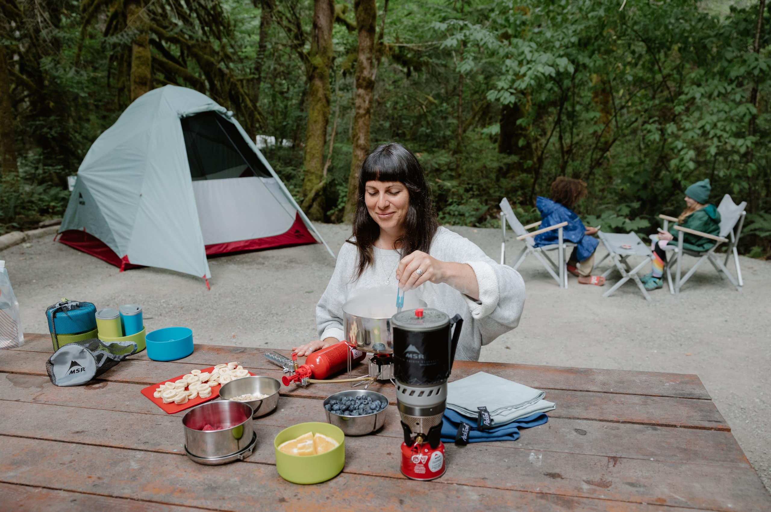 MSR Alpine stainless steel nesting bowl shown for a two-person meal on trail.