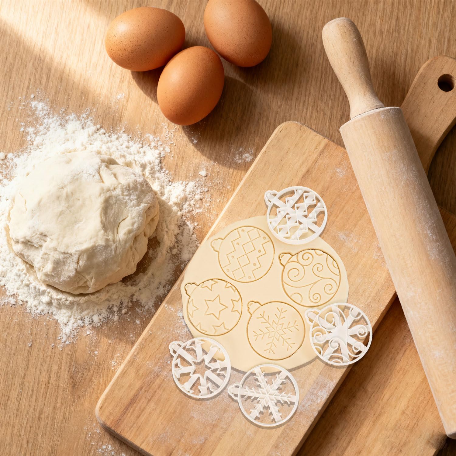 Mtruil ornament ball cutters showcase large, uniform cookies for holiday displays.