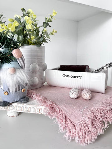 Mud Pie Can-Berry collection adds playful charm to any table setting.