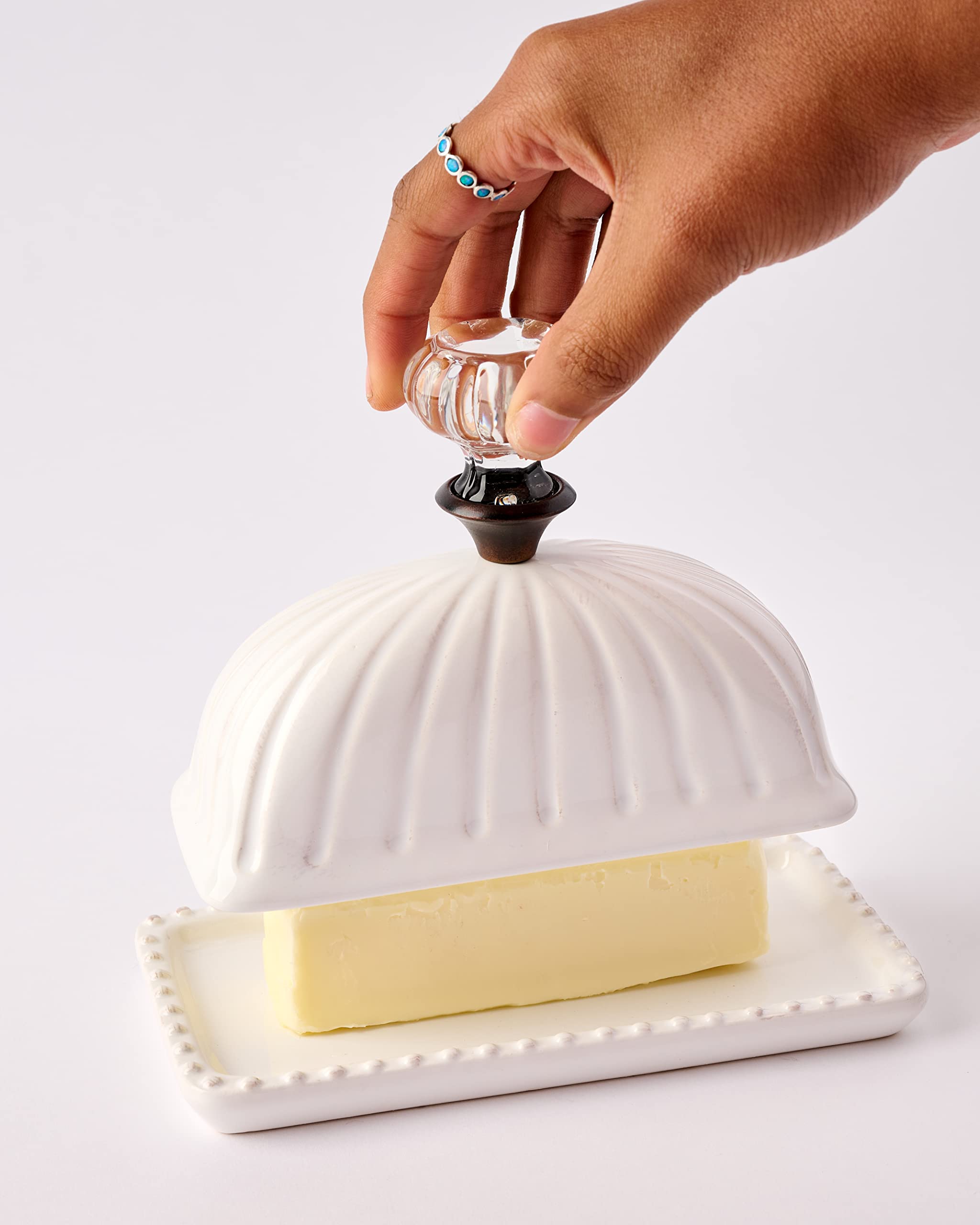 Mud Pie Door Knob Butter Dish lid knob as a decorative focal point.
