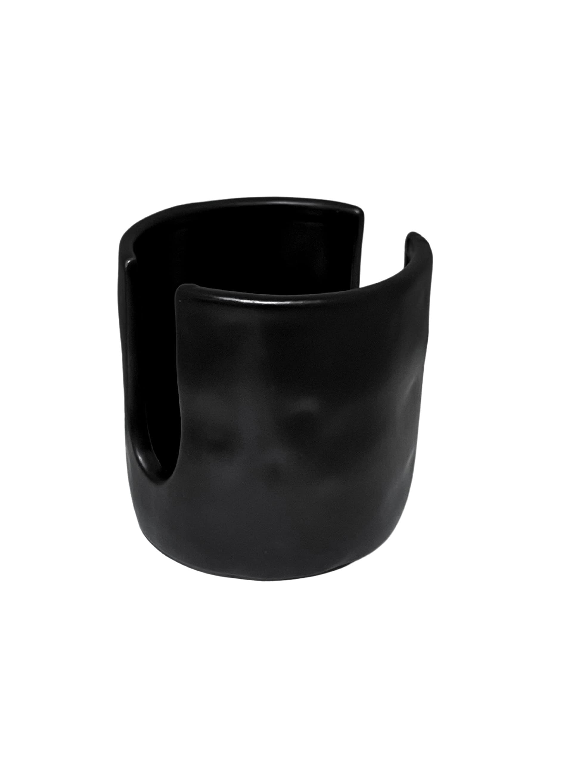 Mud Pie ceramic holder with cut-out slit stores sponge while adding style to the sink area.