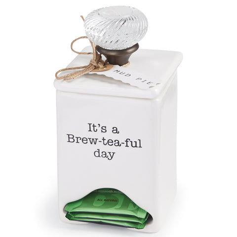 Mud Pie tea bag caddy bottom opening for quick dispensing of tea bags.