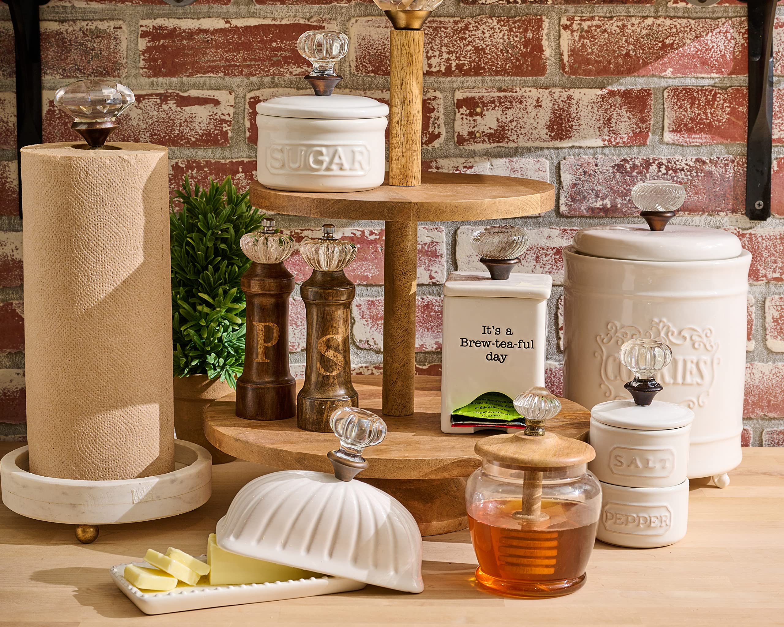 Mud Pie ceramic caddy measures 7 by 3.5 inches for compact storage.