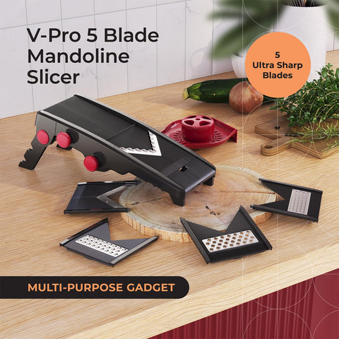 Mueller Austria mandoline with five blades for versatile slicing tasks.