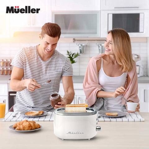 MUELLER HOME retro toaster side view emphasizes stainless steel finish and vintage charm.