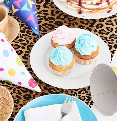Munilail baby shower safari theme coordinates with jungle decorations.
