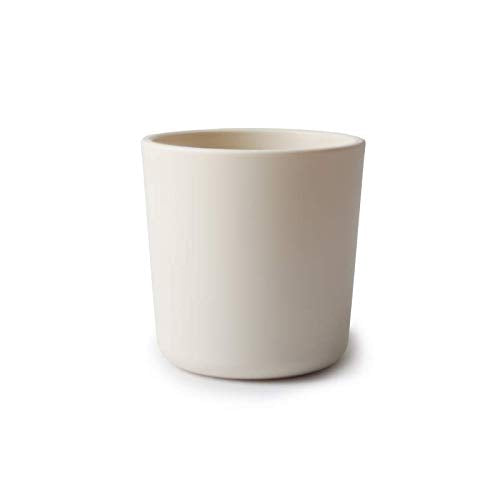 Mushie ivory cups, dishwasher-safe for quick cleanup after meals.