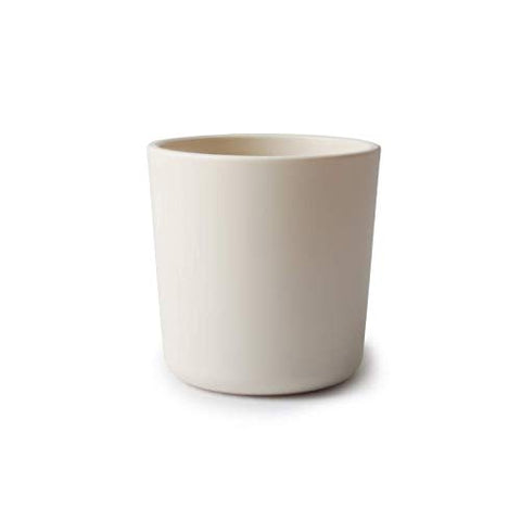 Mushie ivory cups, dishwasher-safe for quick cleanup after meals.