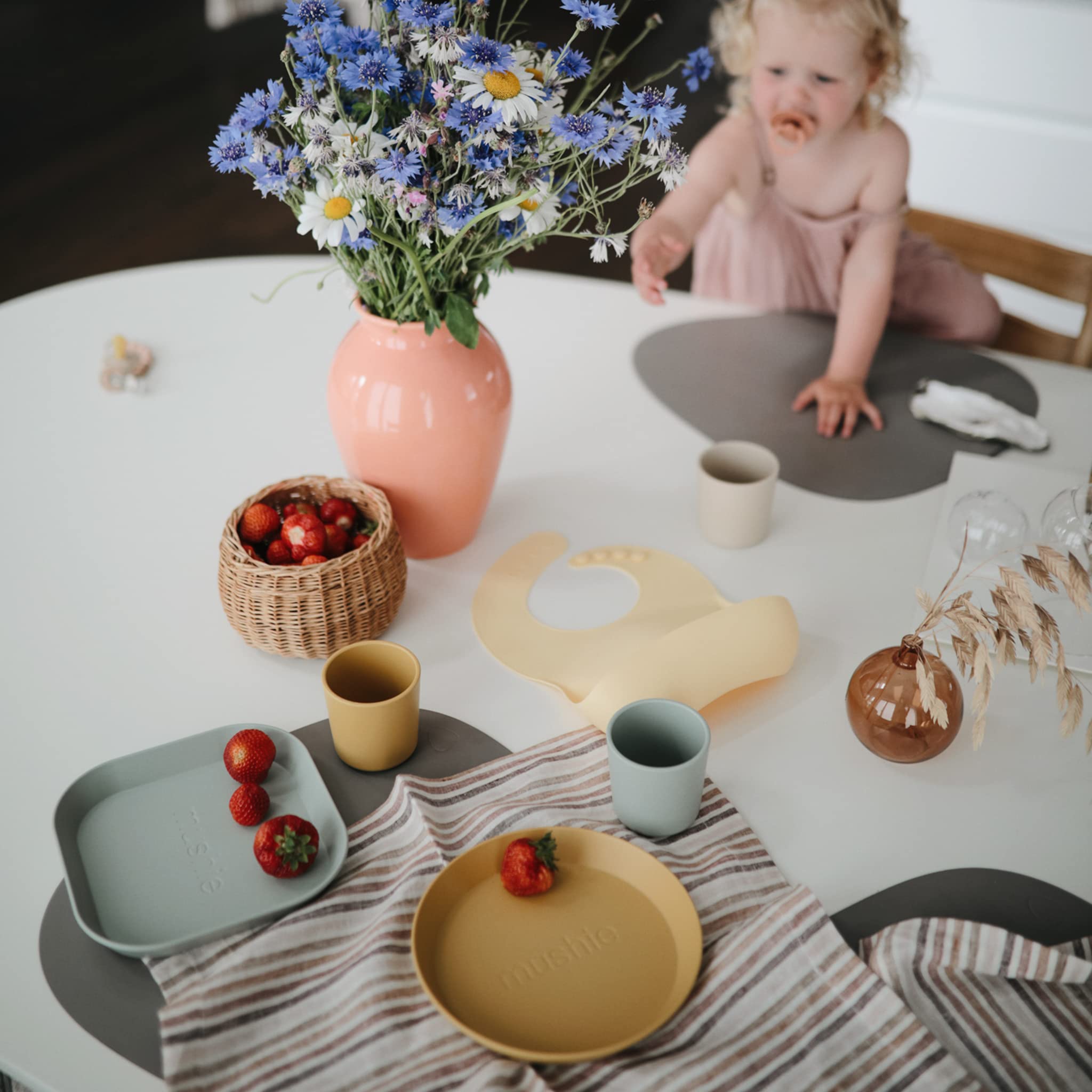 Mushie ivory cups are lightweight and easy for children to lift.