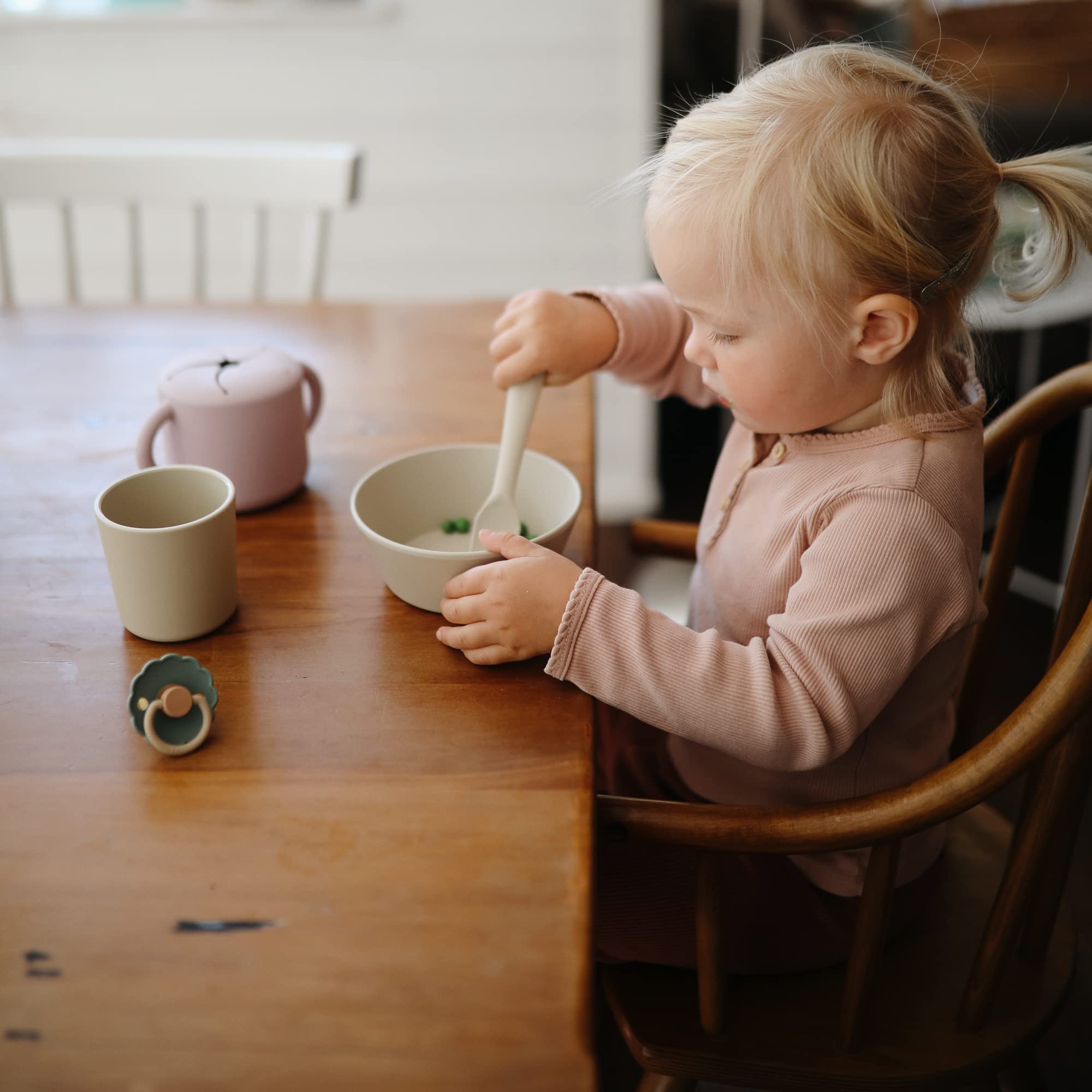 Mushie ivory cups, microwave-safe for reheating drinks or soups.