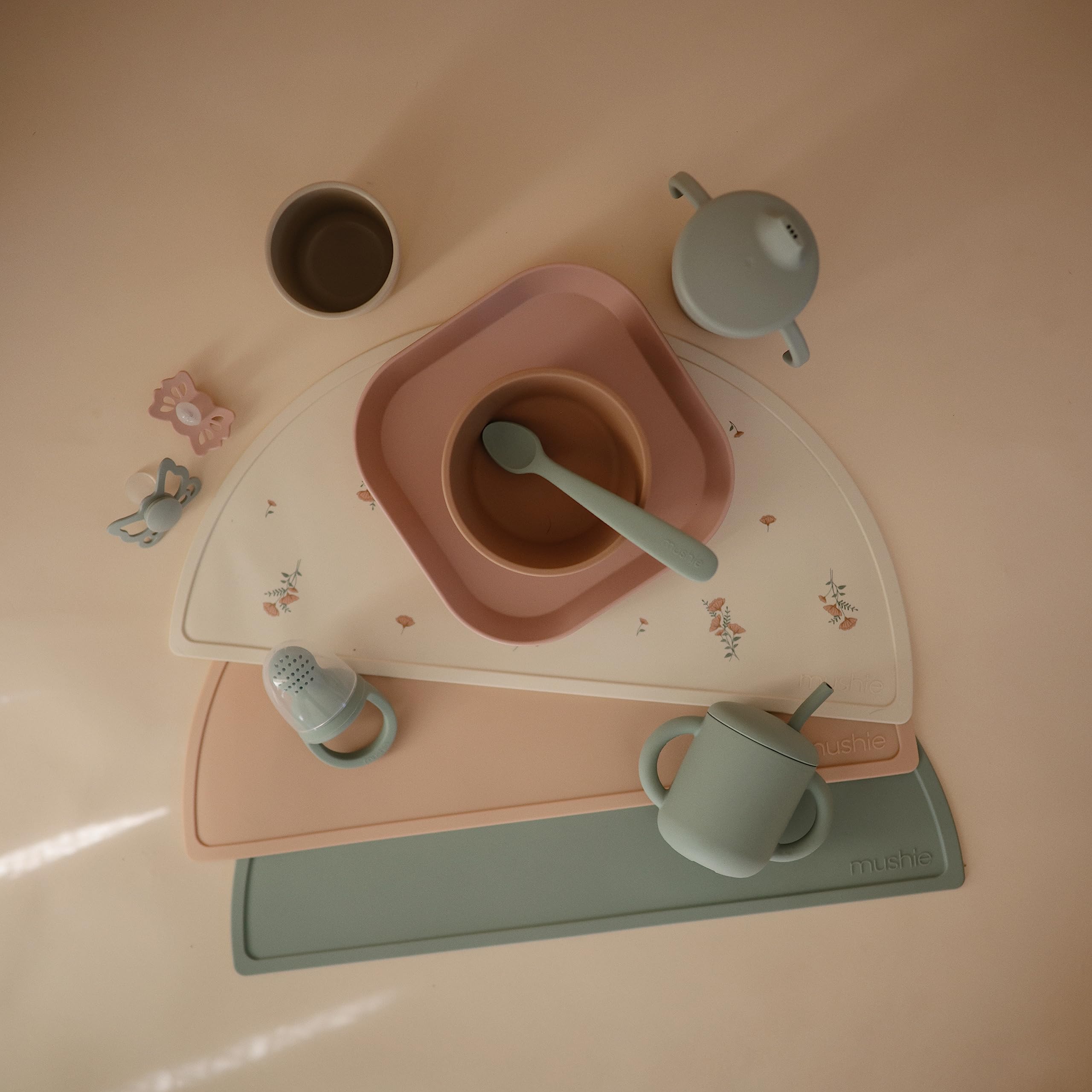 Mushie square dinnerware plates blush on kitchen counter, dishwasher-safe