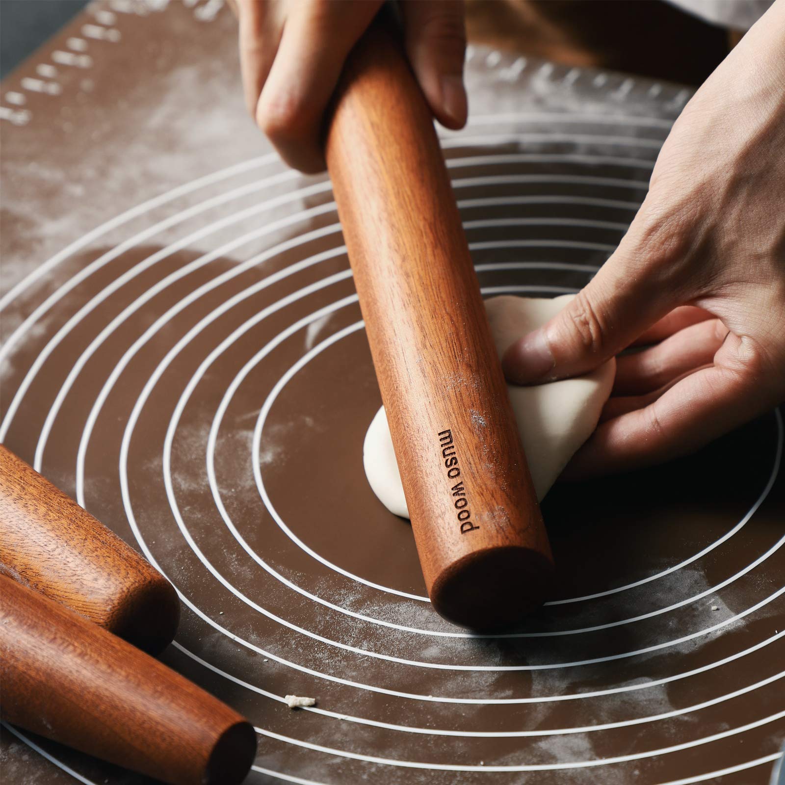Muso Wood Sapele dowel rolling pin finish detail highlights natural wood knots.