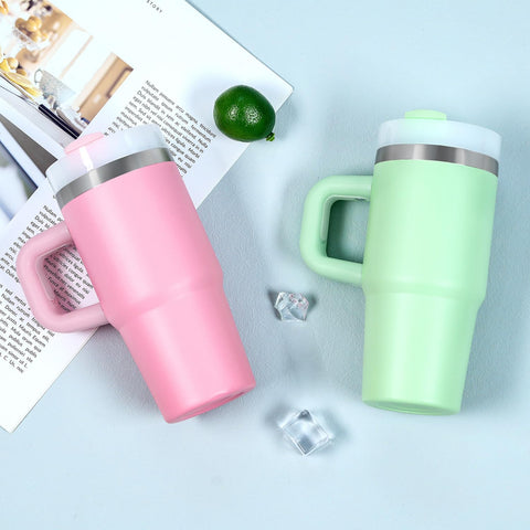 Muwnrol pink tumbler includes straw and cleaning brush.