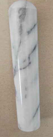 MV Trading MTP5RS marble pestle in use for grinding herbs.