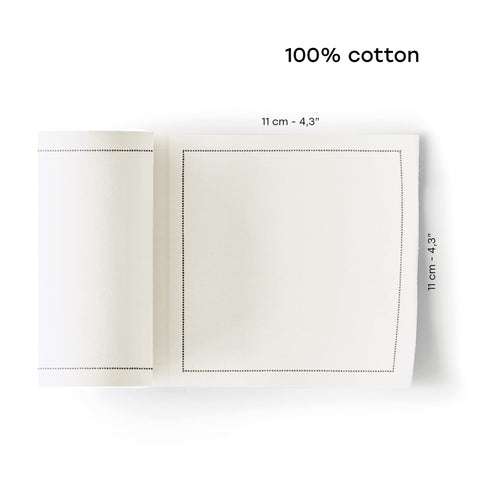 Cream MY DRAP napkin on perforated roll ready for tear-off serving.