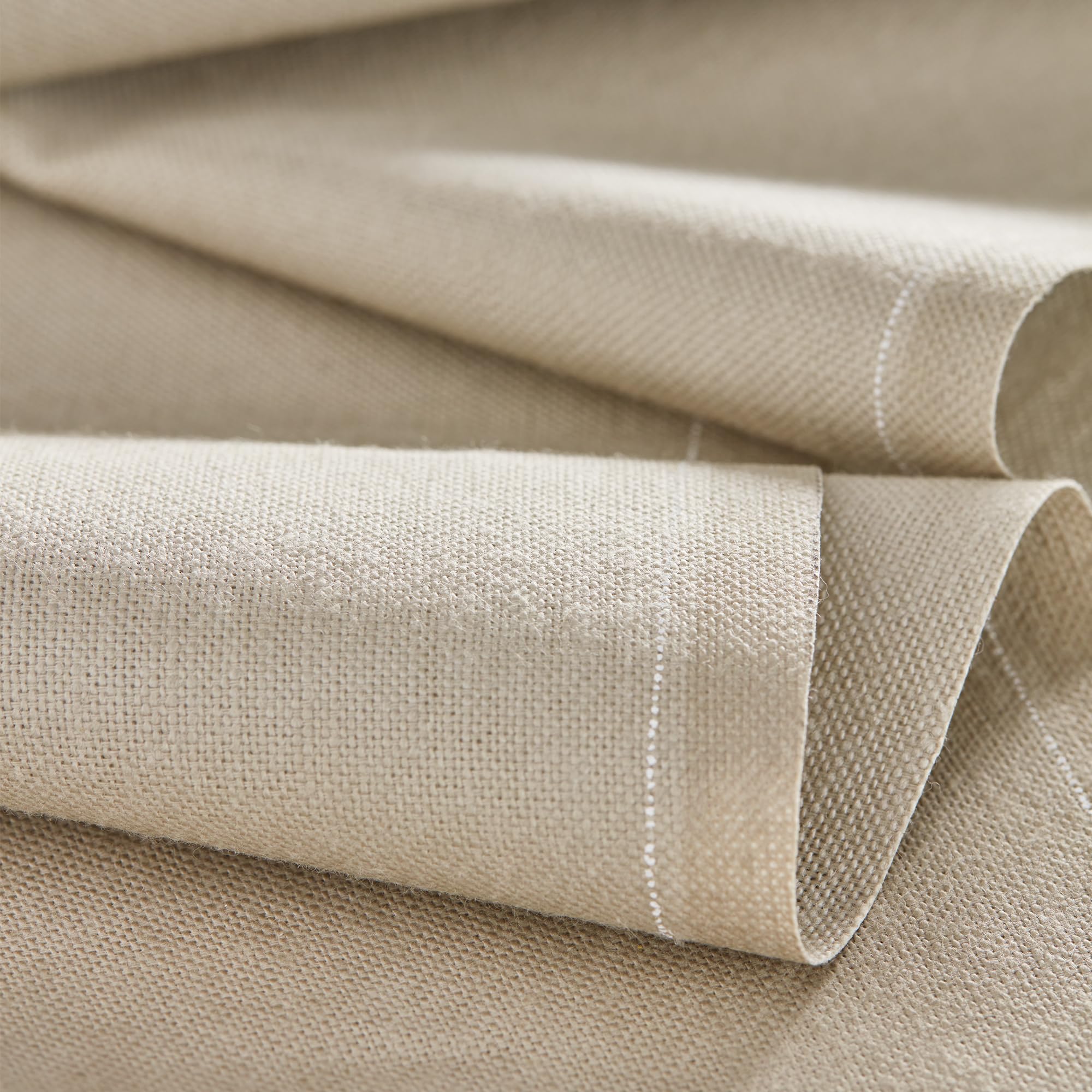 MY DRAP sand-color napkins complement tableware for cohesive dining scenes.