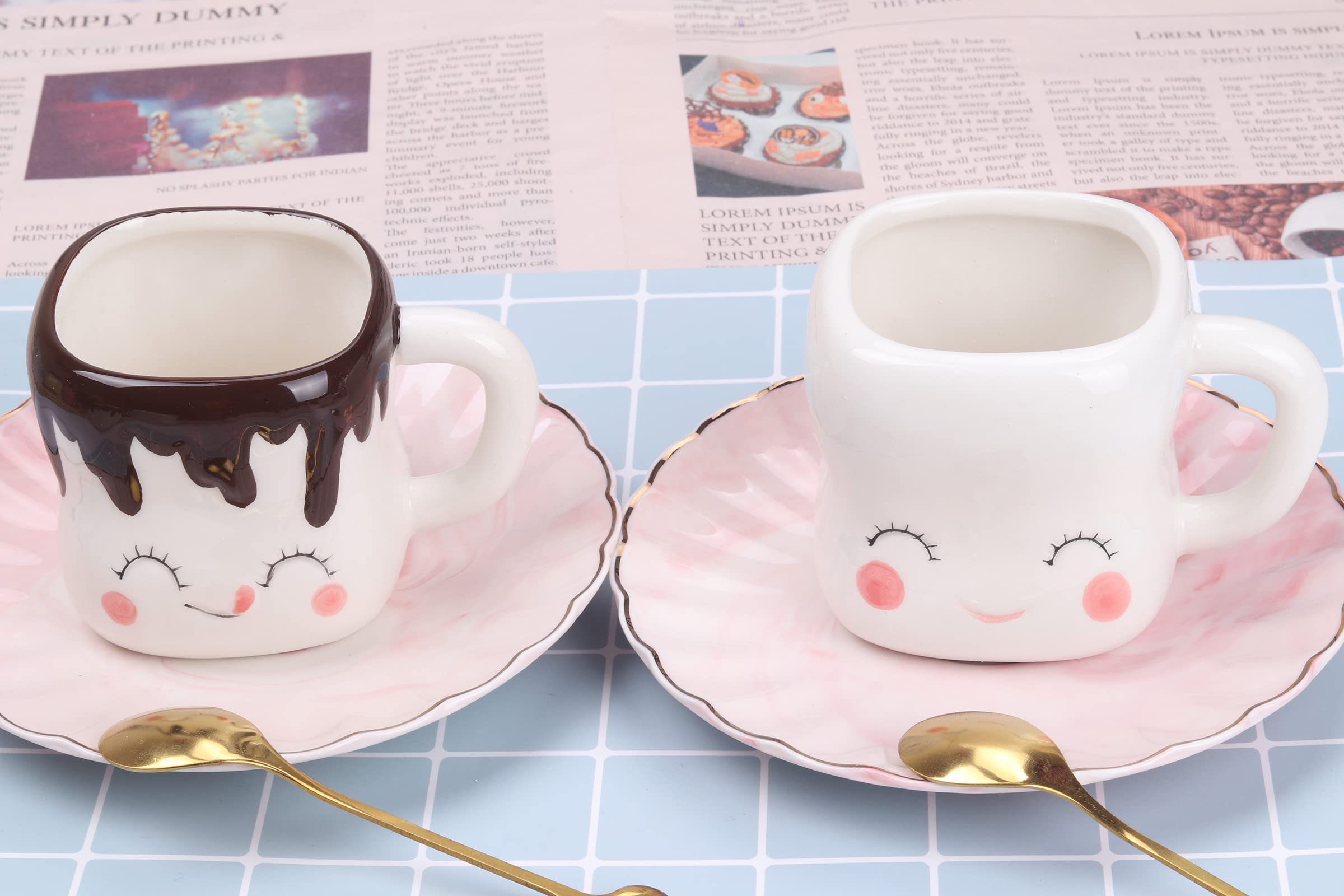 Mycts white ceramic mugs ideal for hot cocoa or tea.