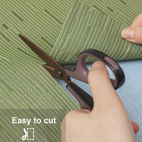 Green vinyl woven placemats add style while protecting surfaces.