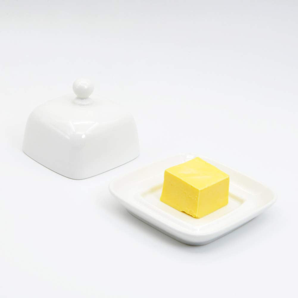 NAGU porcelain butter dish on counter, elegant design enhances everyday dining.
