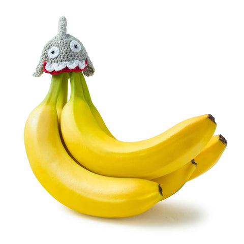 Nana Hats magnetic silicone caps on banana crown seal for longer freshness.