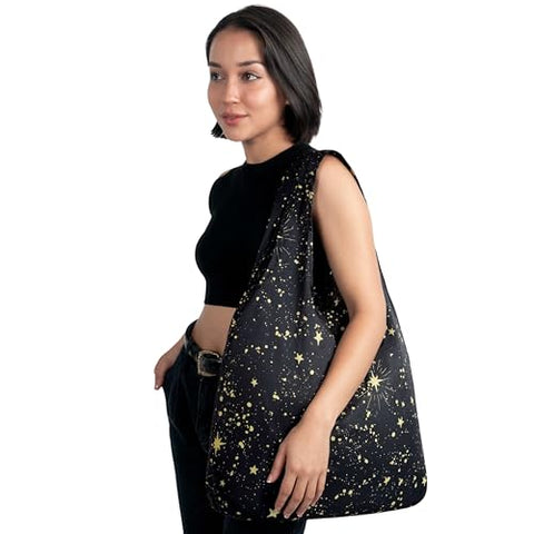 Nanobag self-folding ultralight nylon demonstrates compact storage for travel.