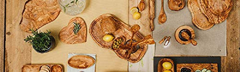 Naturally Med olive wood cheese board, perfect for serving charcuterie.