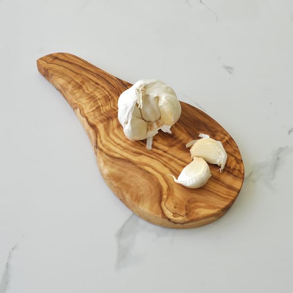 Naturally Med olive wood garlic board close-up showing smooth finish and durability.