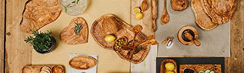 Naturally Med olive wood spoon handle close-up, showcasing durable, natural grain ideal for sautéing.