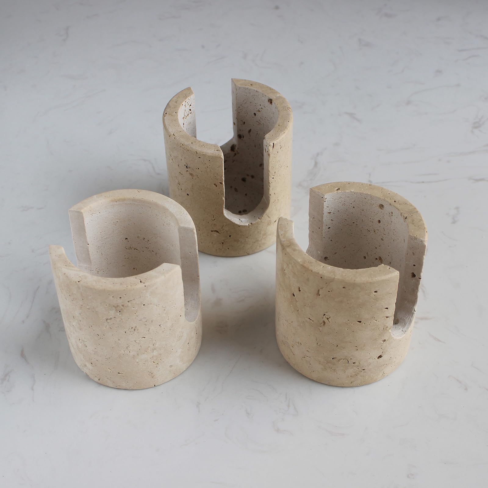 Nawgnail travertine sponge holder textured surface emphasizes durability and style.
