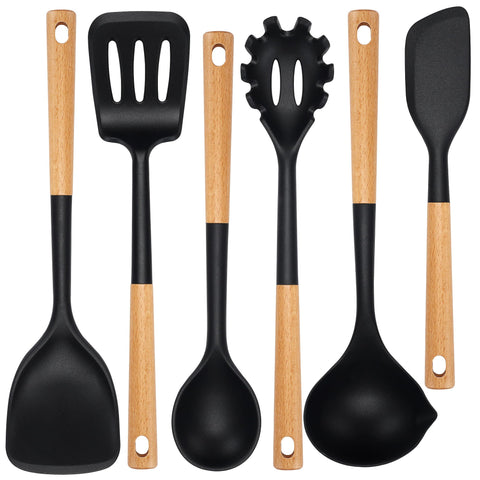 NCUE silicone spatula demonstrates heat resistance for non-stick pans.
