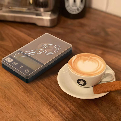 NEOWEIGH espresso scale silicone mat included enhances stability during use.
