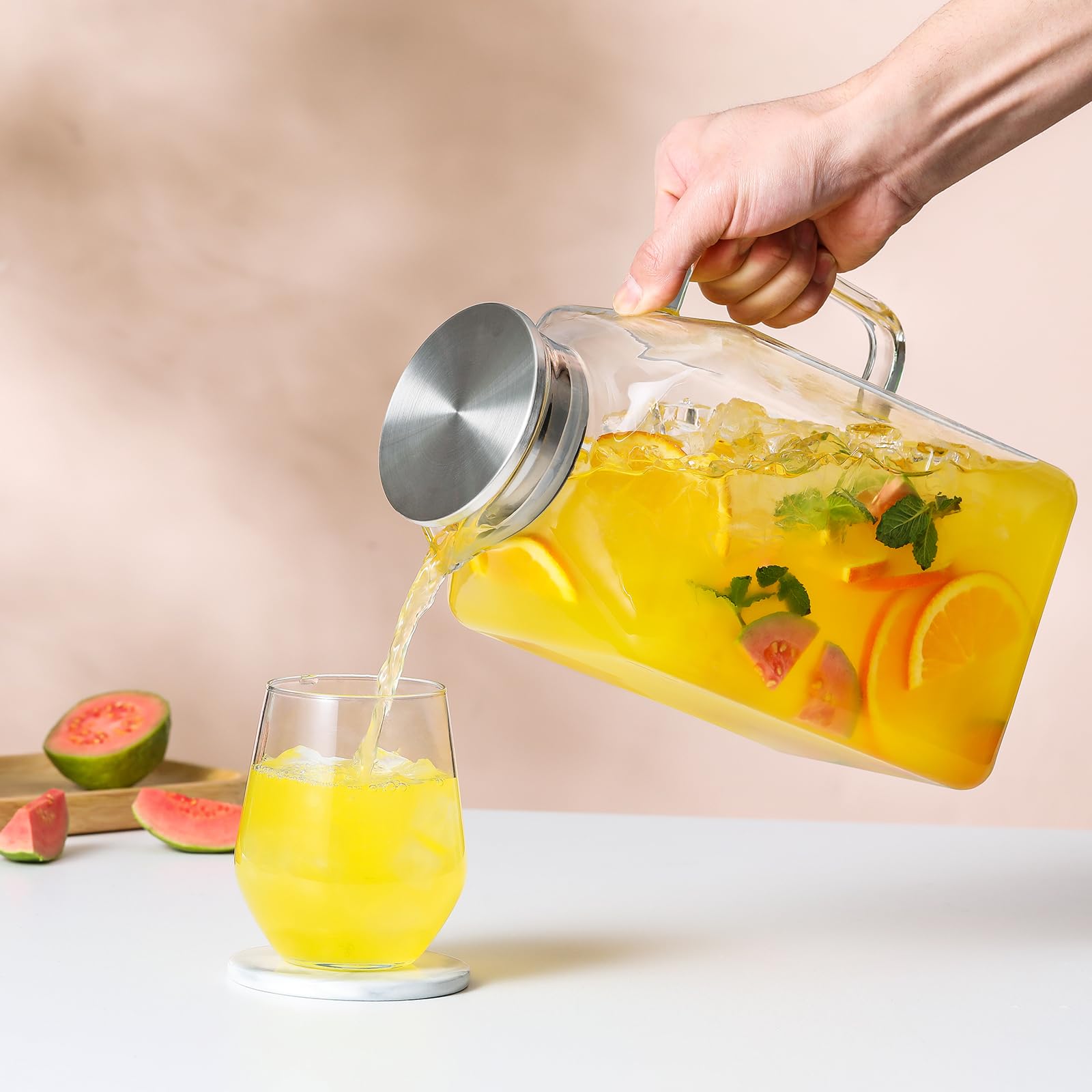 NETANY stainless steel pouring lid with strainer for tea leaves and seeds.