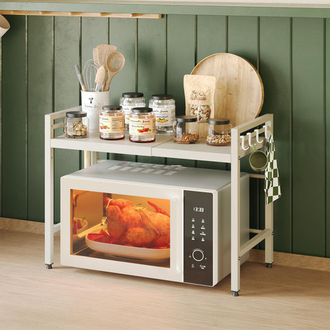 NETEL extendable kitchen shelf demonstrates adjustable length for different microwave sizes.