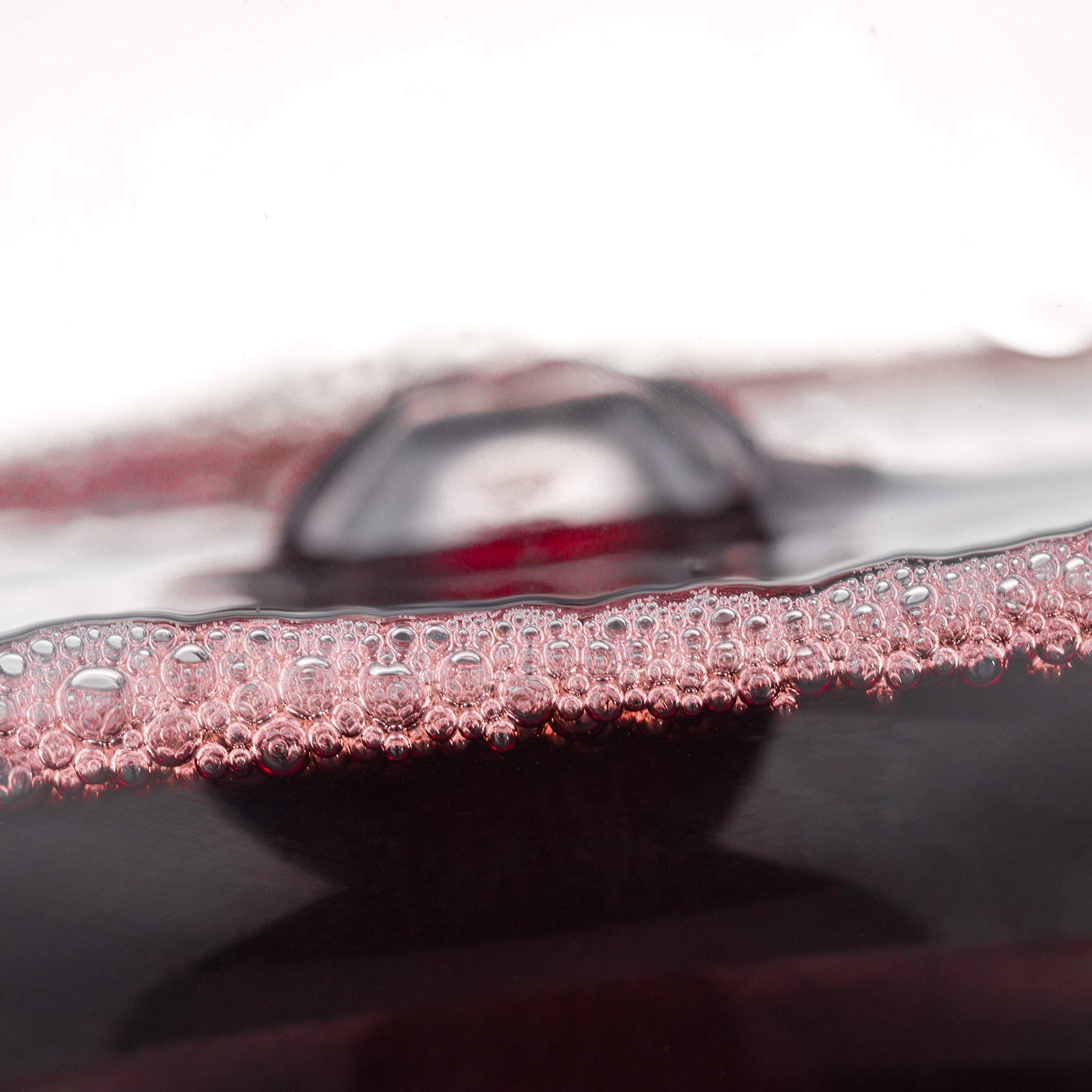 Artistic groove base keeps YouYah decanter steady during pouring