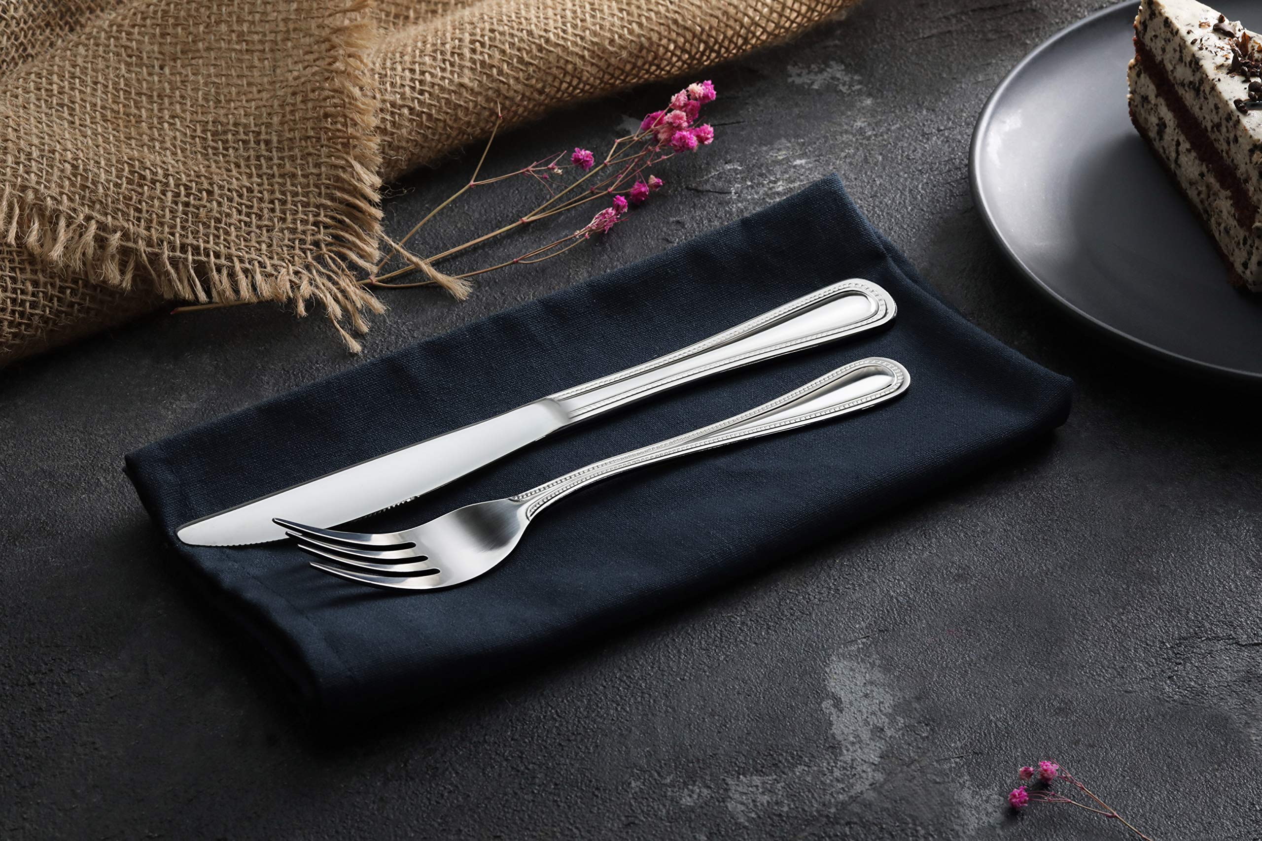 New Star 58444 knife complements a 12-piece bead-pattern silverware set.