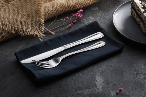New Star 58444 knife complements a 12-piece bead-pattern silverware set.