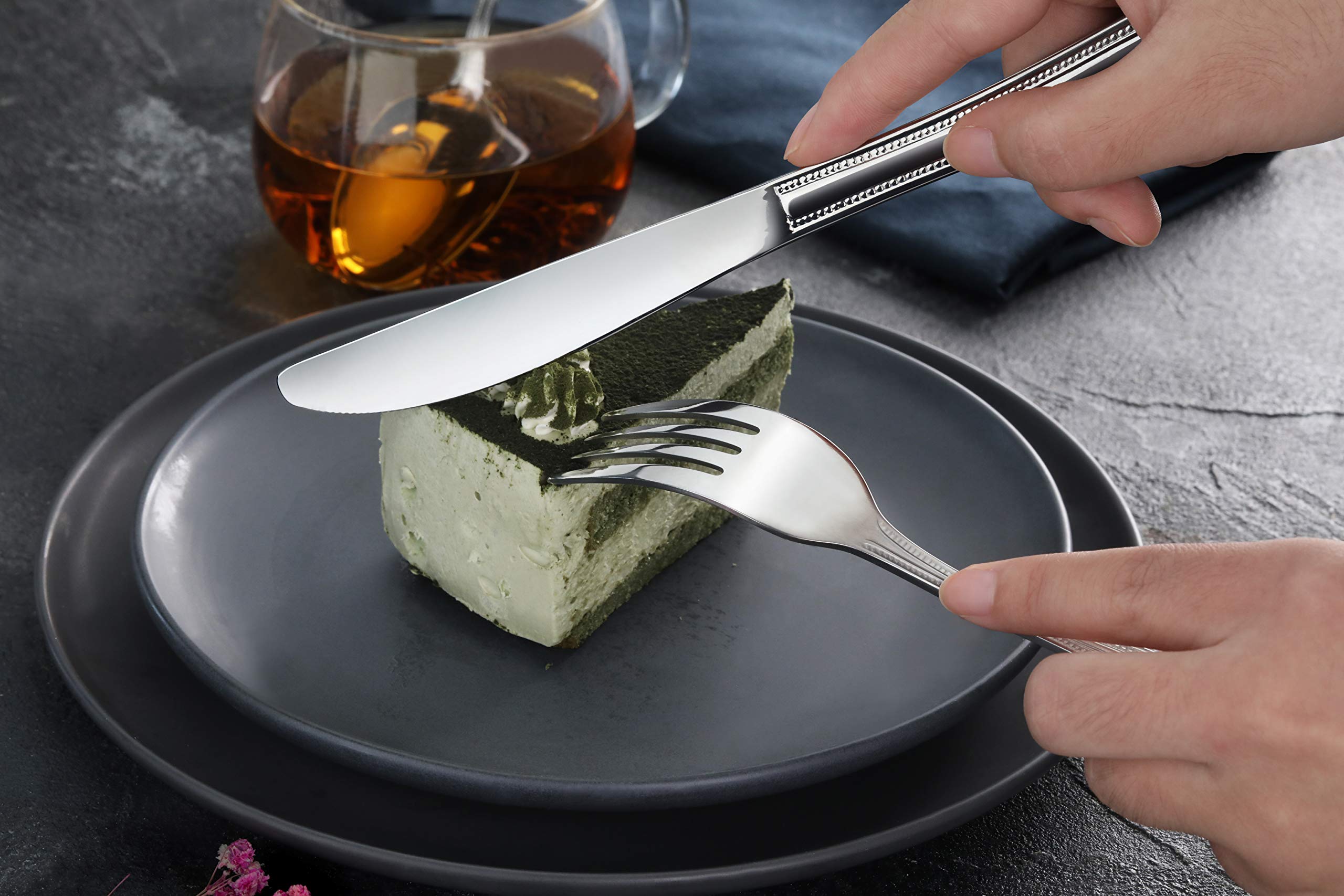 Durable stainless steel construction visible on the New Star 58444 knife.